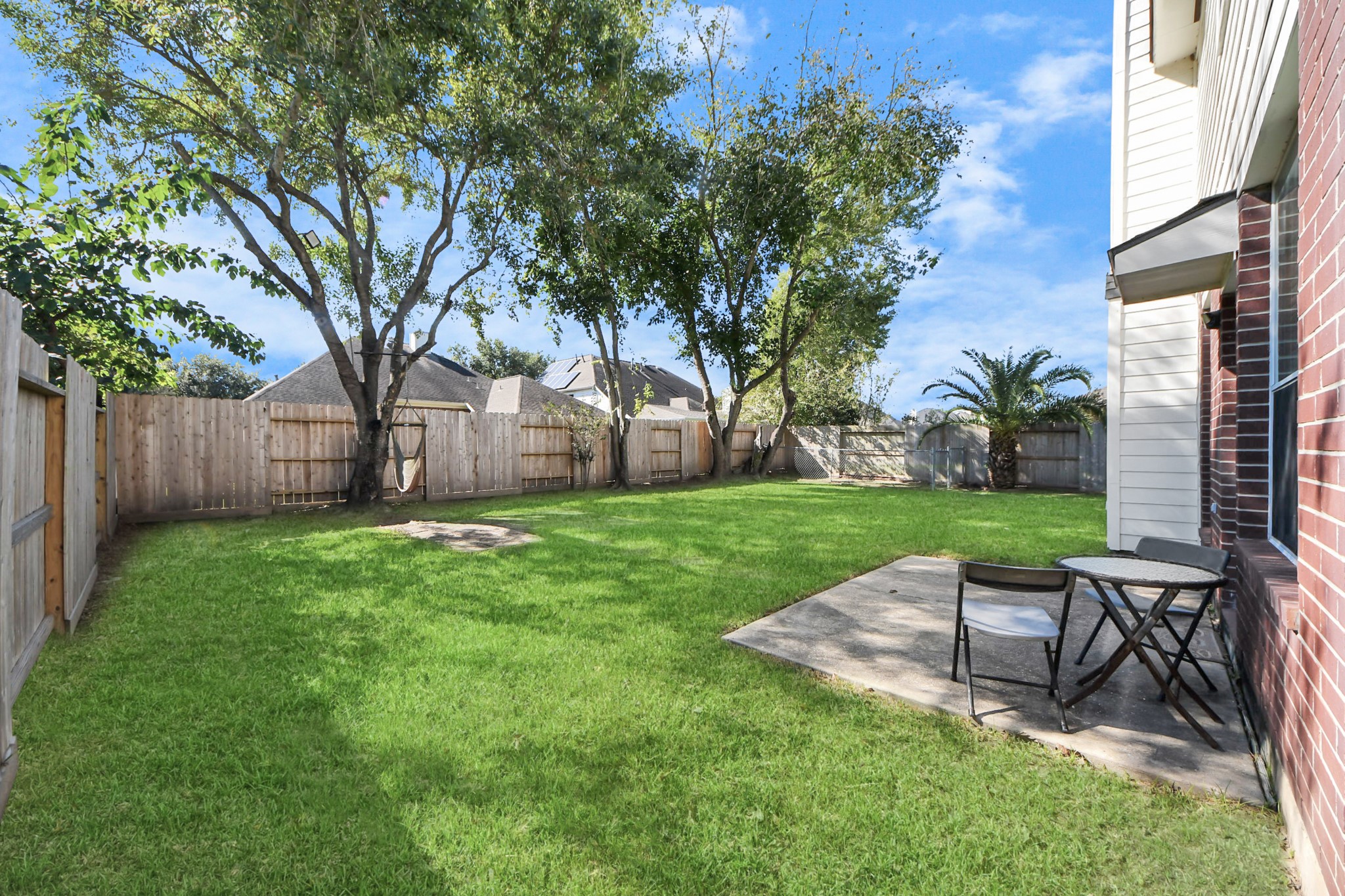 13635 Treebank Lane Houston, TX 77070 - Photo 30 of 37 a view of a backyard with a garden