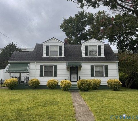 751 Leonard Road Norfolk, VA 23518 - Photo 1 of 11 White siding exterior with dark shutters, two dorm