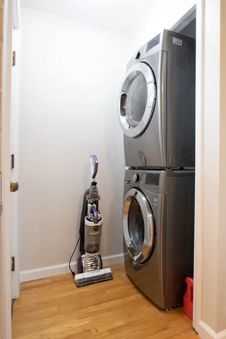 a view of a storage and utility room with a washer and dryer