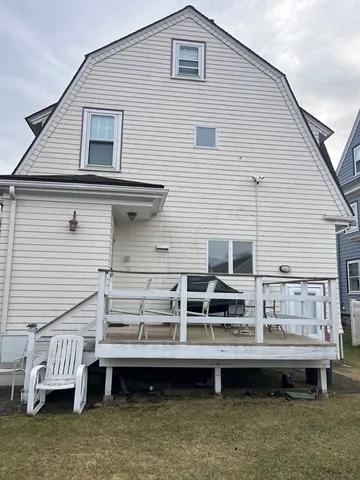 a view of a house with a roof deck