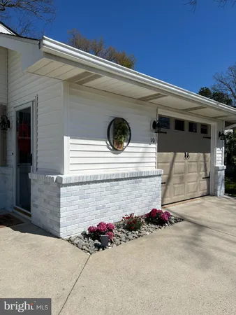 a front view of a house with a garage