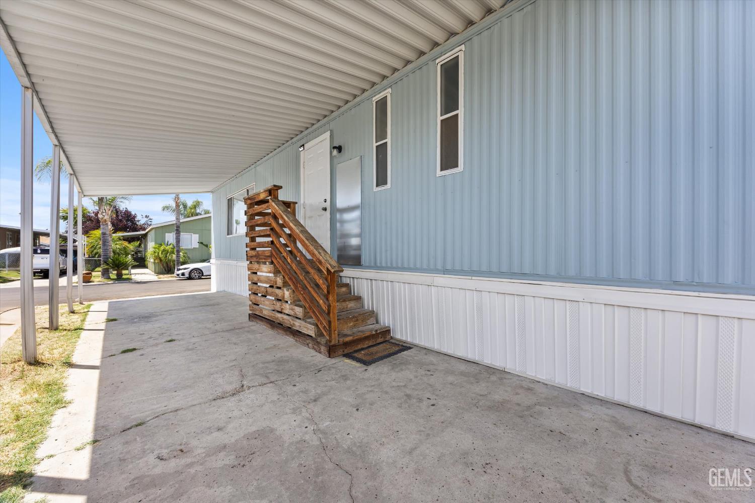 Undisclosed Address Bakersfield, CA 93306 - Photo 30 of 30 a view of an empty room with a staircase