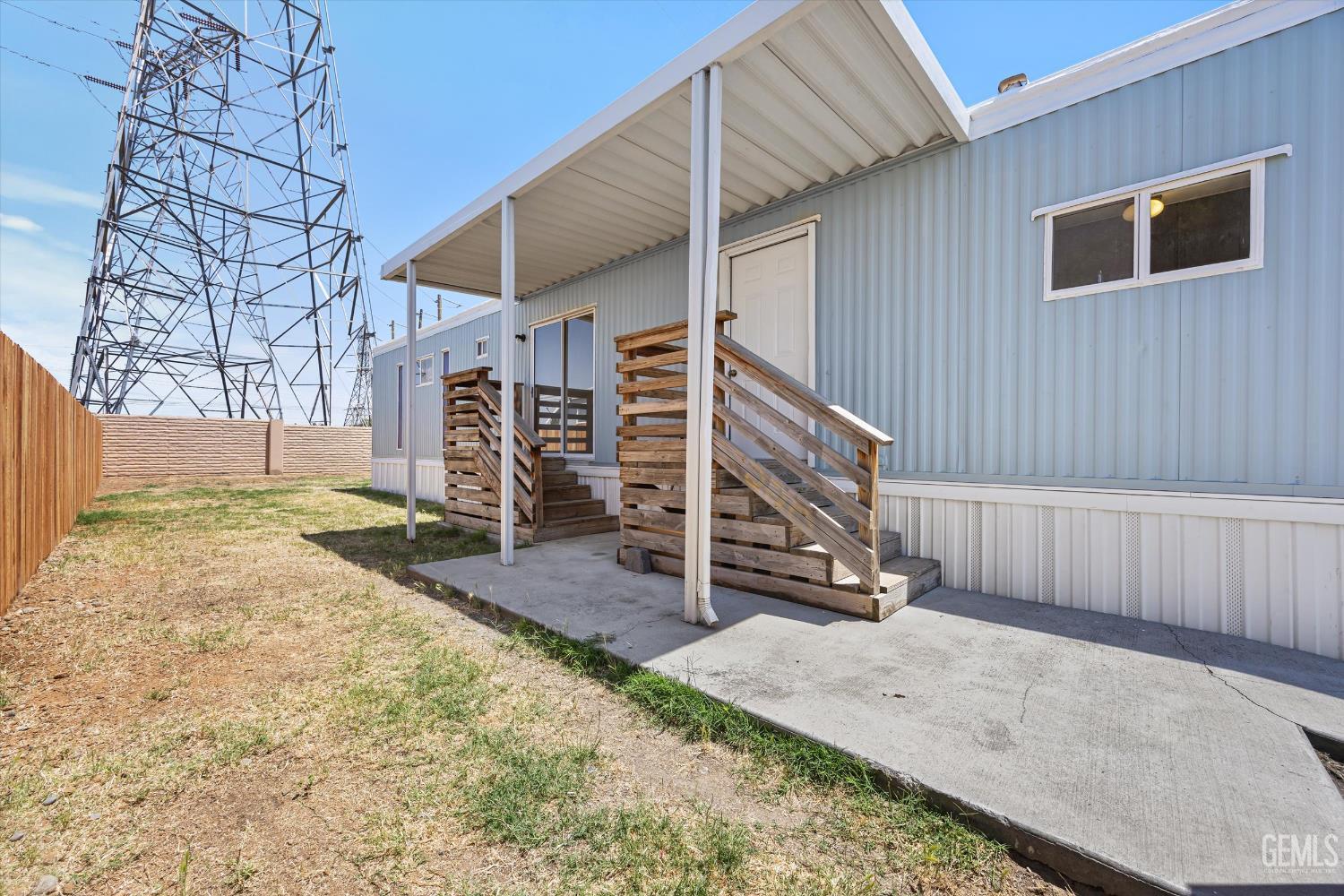 Undisclosed Address Bakersfield, CA 93306 - Photo 4 of 30 front view of a house with a yard