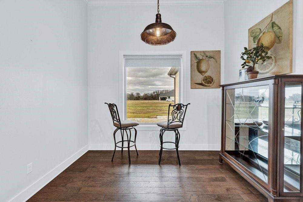 580 County Road 3422 Wills Point, TX 75169 - Photo 18 of 38 a view of a dining room with furniture window and wooden floor