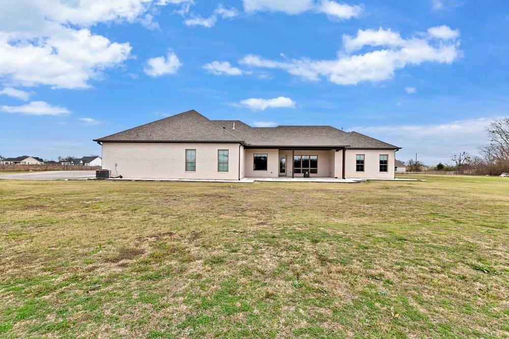 580 County Road 3422 Wills Point, TX 75169 - Photo 2 of 38 a house with yard in front of it