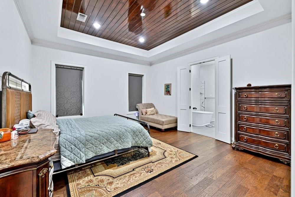 580 County Road 3422 Wills Point, TX 75169 - Photo 23 of 38 a bedroom with a bed and dresser