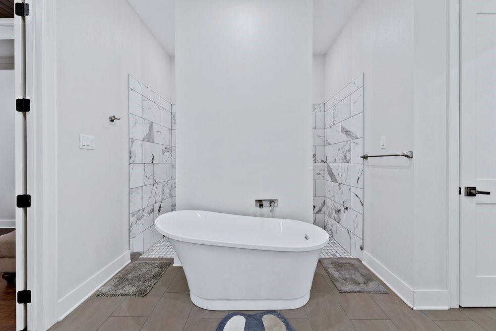 580 County Road 3422 Wills Point, TX 75169 - Photo 25 of 38 a bathroom with a sink a toilet and shower