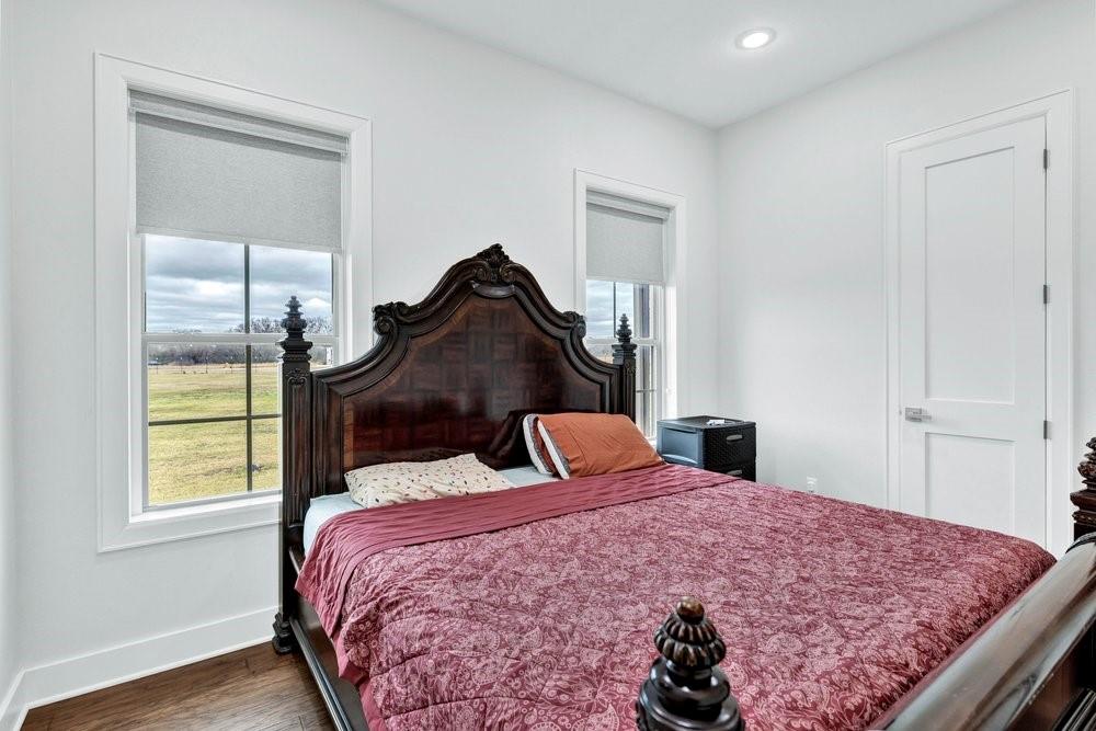 580 County Road 3422 Wills Point, TX 75169 - Photo 32 of 38 a bedroom with a bed and a window