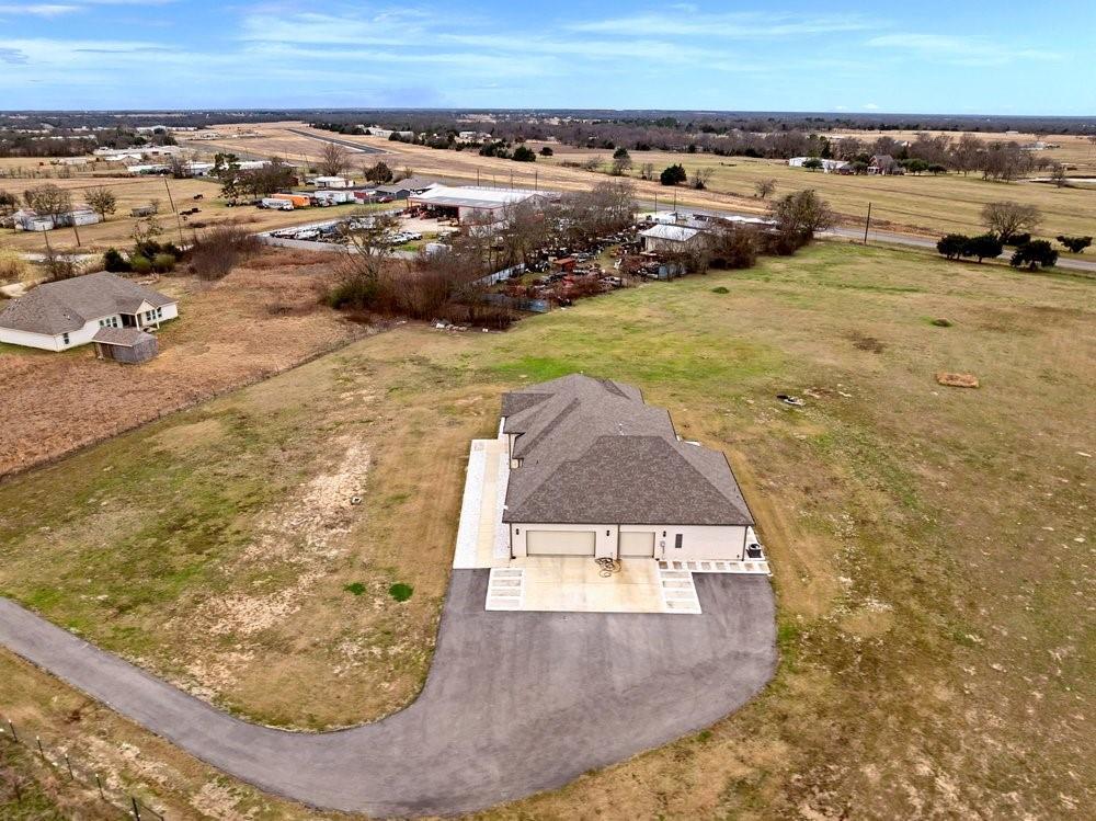 580 County Road 3422 Wills Point, TX 75169 - Photo 8 of 38 an aerial view of a house with a yard