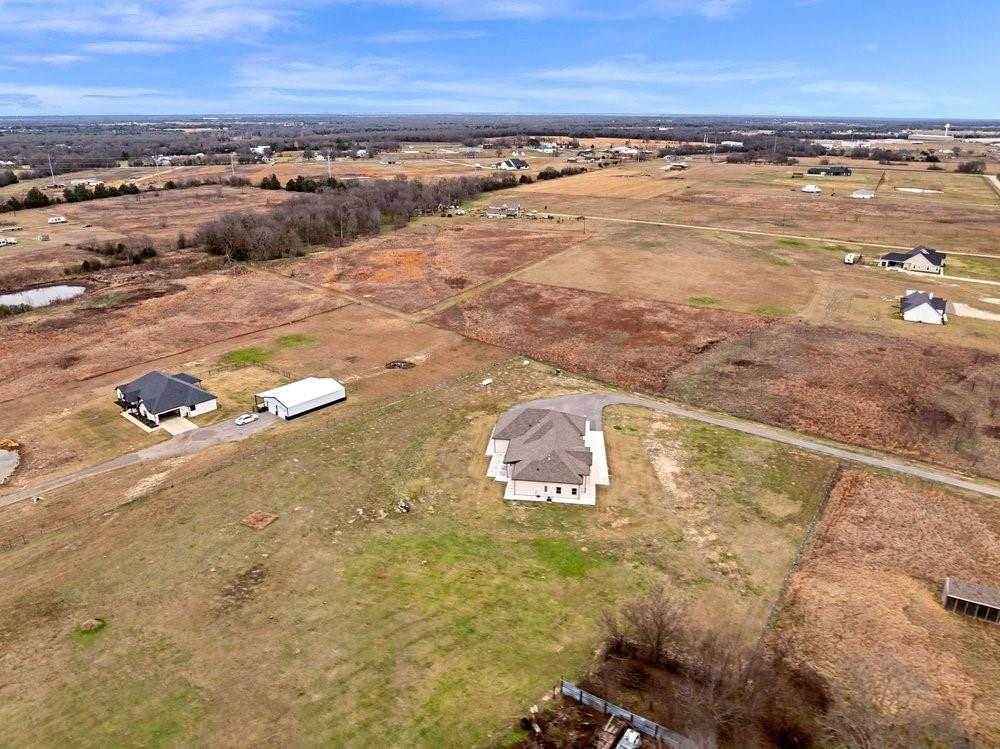 580 County Road 3422 Wills Point, TX 75169 - Photo 9 of 38 a view of an ocean and beach
