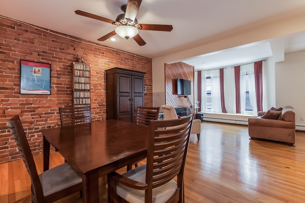 36 Symphony Road, Unit 3B Boston, MA 02115 - Photo 8 of 21 a dining room with furniture and window