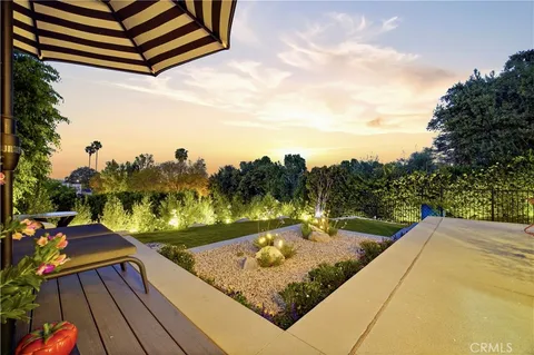 a view of a backyard and a patio