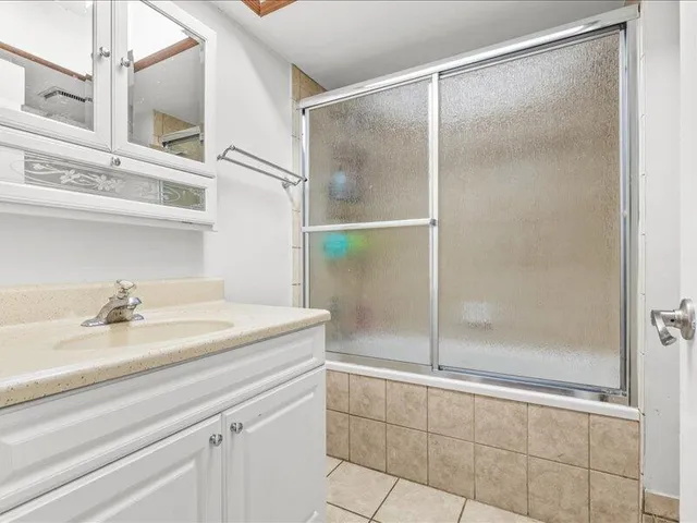 a view of a house with a snow in the yard