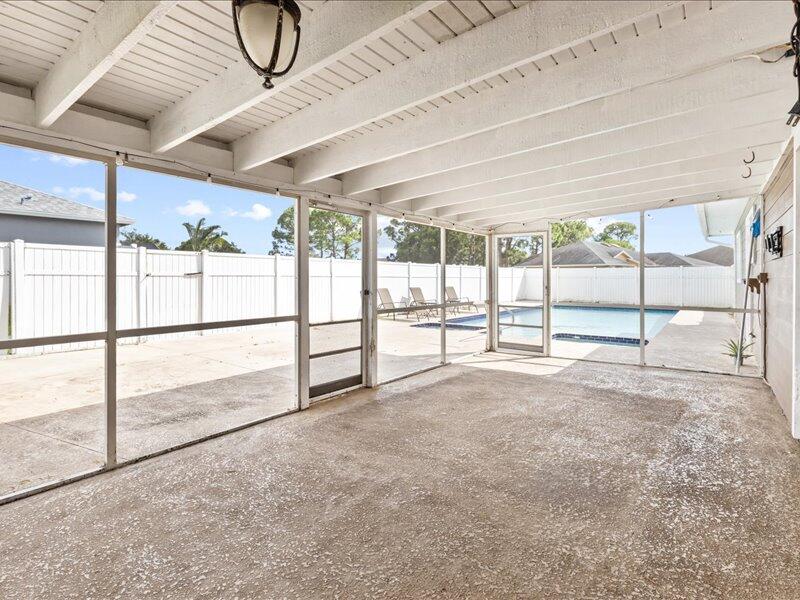1297 Southeast Floresta Drive Port St. Lucie, FL 34983 - Photo 26 of 42 a view of an entryway