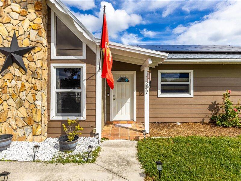 1297 Southeast Floresta Drive Port St. Lucie, FL 34983 - Photo 3 of 42 03-flor ex-11