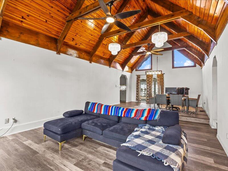 1297 Southeast Floresta Drive Port St. Lucie, FL 34983 - Photo 7 of 42 a living room with furniture and a rug