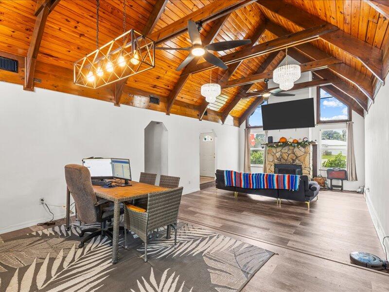 1297 Southeast Floresta Drive Port St. Lucie, FL 34983 - Photo 9 of 42 a view of a chairs and table in the patio