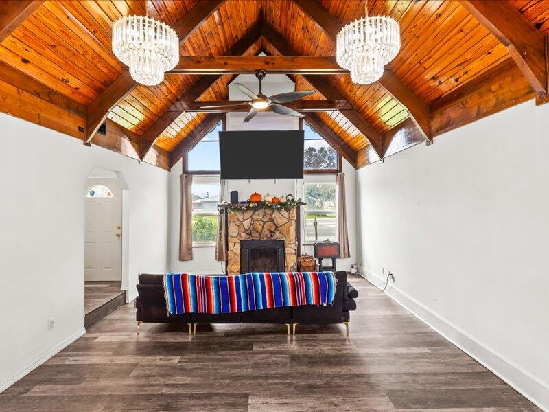 1297 Southeast Floresta Drive Port St. Lucie, FL 34983 - Photo 10 of 42 a view of entryway wooden floor and chandelier