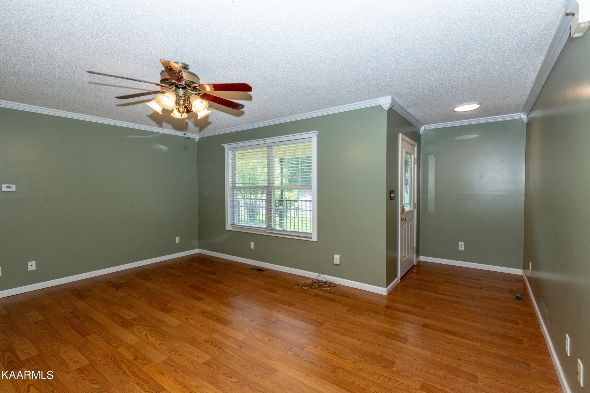 1613 Sevierville Road Maryville, TN 37804 - Photo 11 of 50 a view of an empty room with window and wooden floor