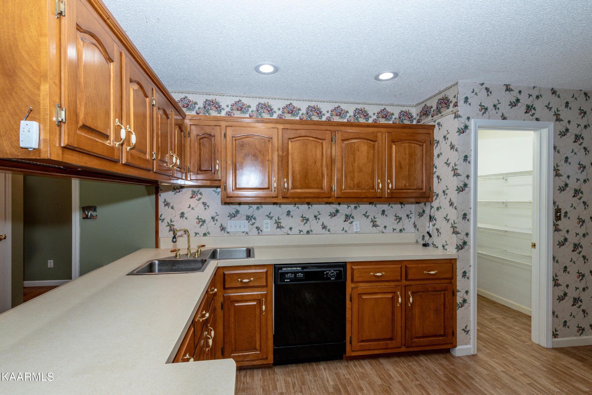 1613 Sevierville Road Maryville, TN 37804 - Photo 18 of 50 a kitchen with a sink stove and cabinets