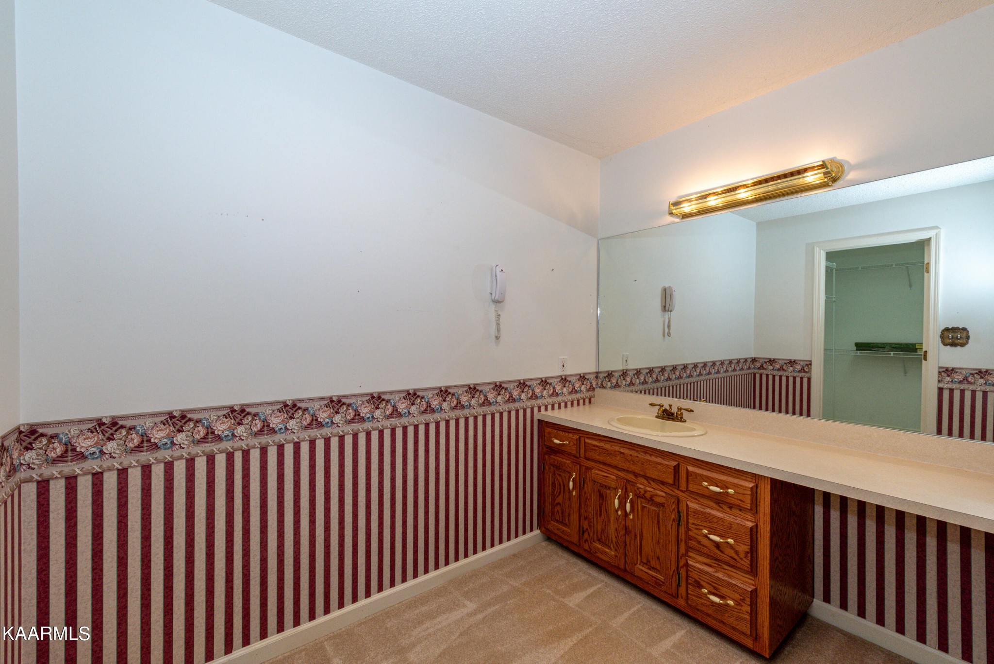 1613 Sevierville Road Maryville, TN 37804 - Photo 27 of 50 a bathroom with a double vanity sink and a mirror