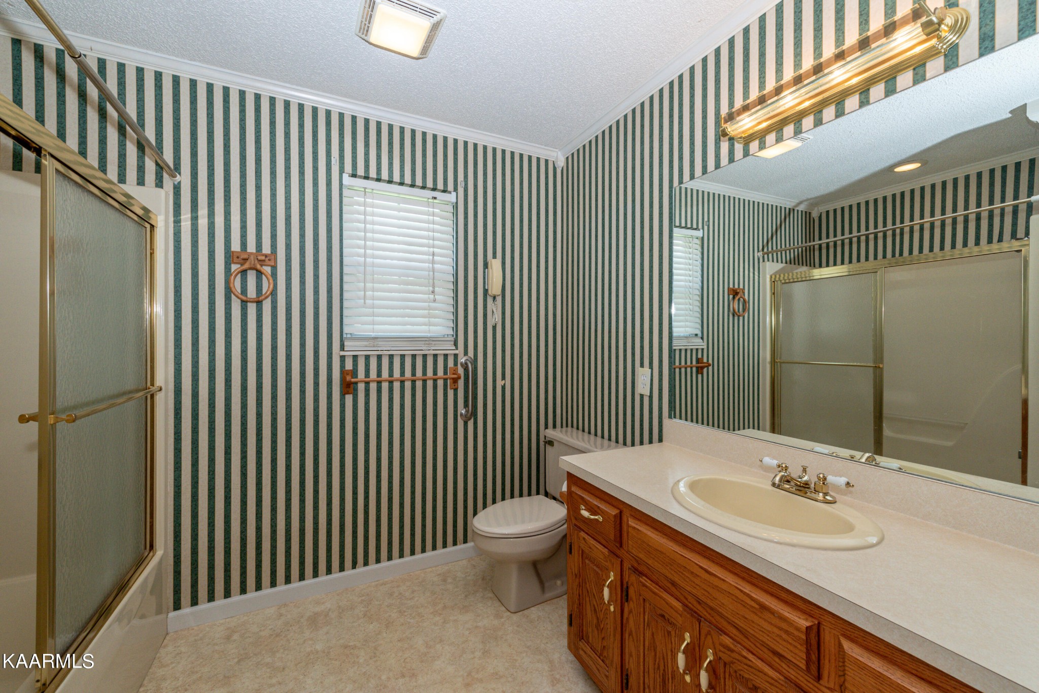 1613 Sevierville Road Maryville, TN 37804 - Photo 36 of 50 a bathroom with a sink a toilet and shower