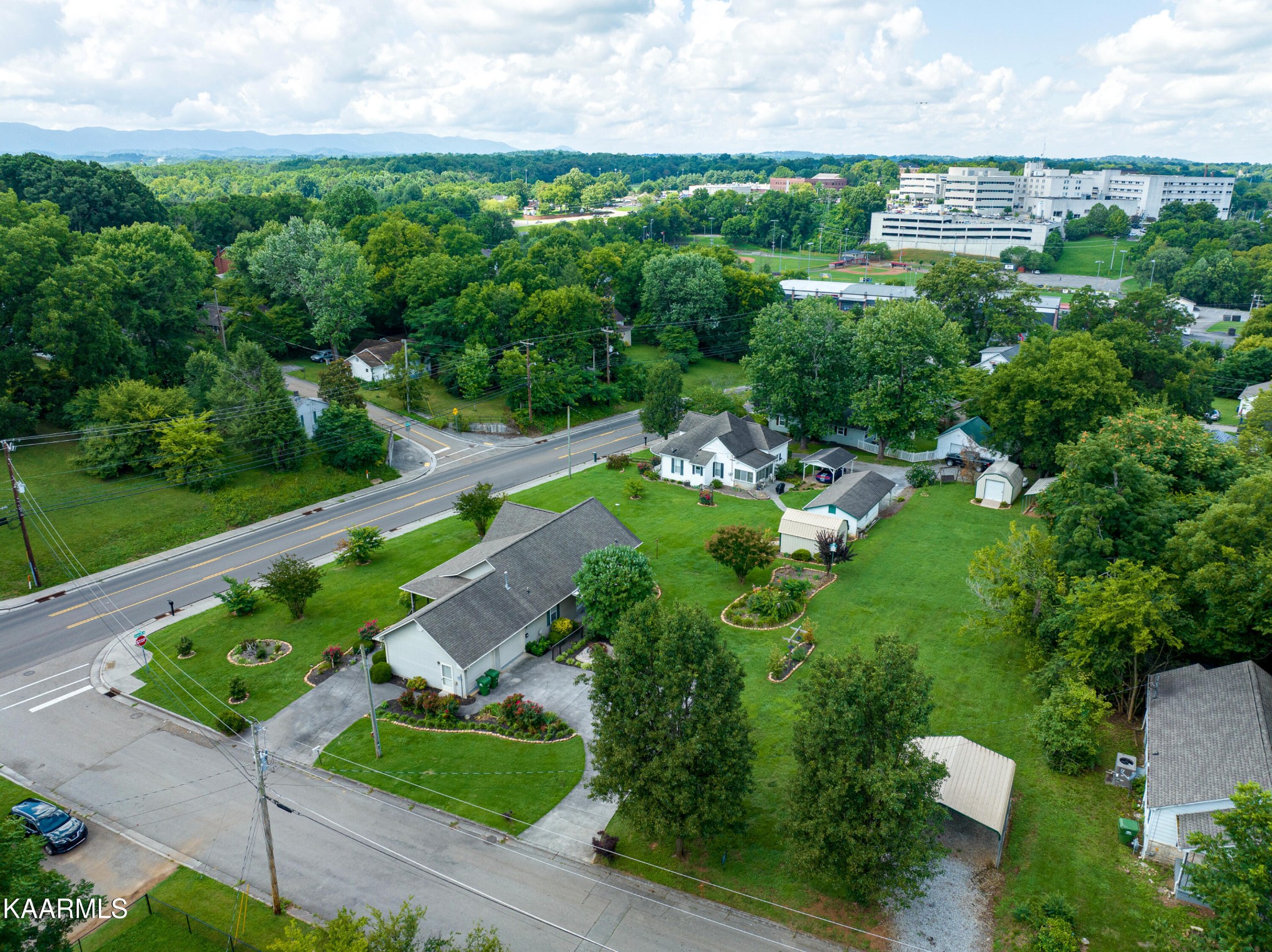1613 Sevierville Road Maryville, TN 37804 - Photo 46 of 50 an aerial view of a house with a yard and lake view