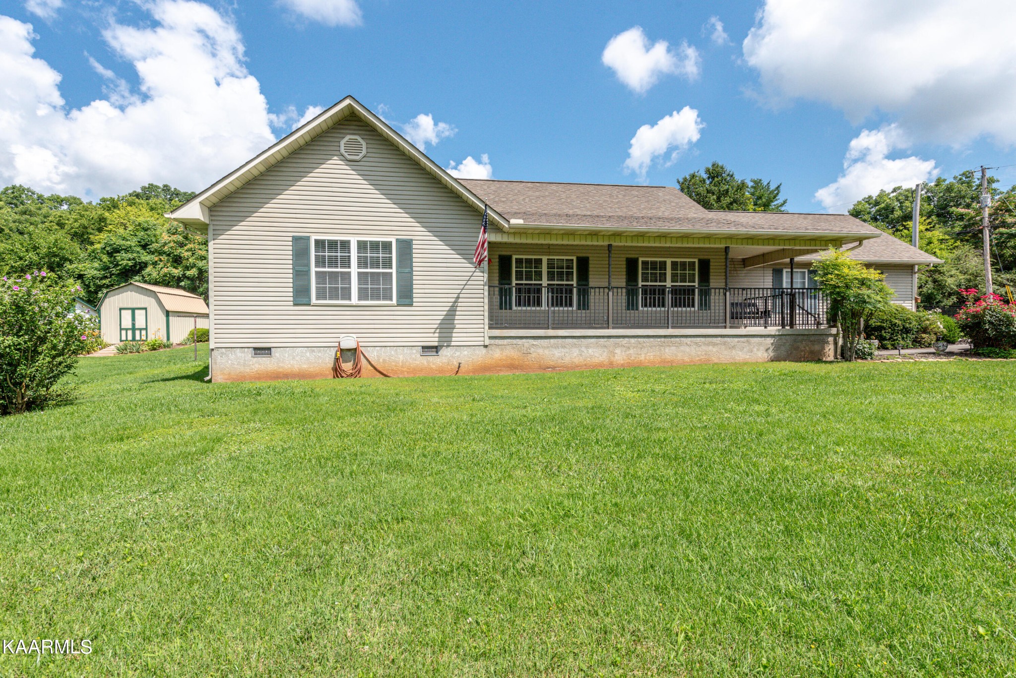 1613 Sevierville Road Maryville, TN 37804 - Photo 50 of 50 a front view of a house with a yard and potted plants