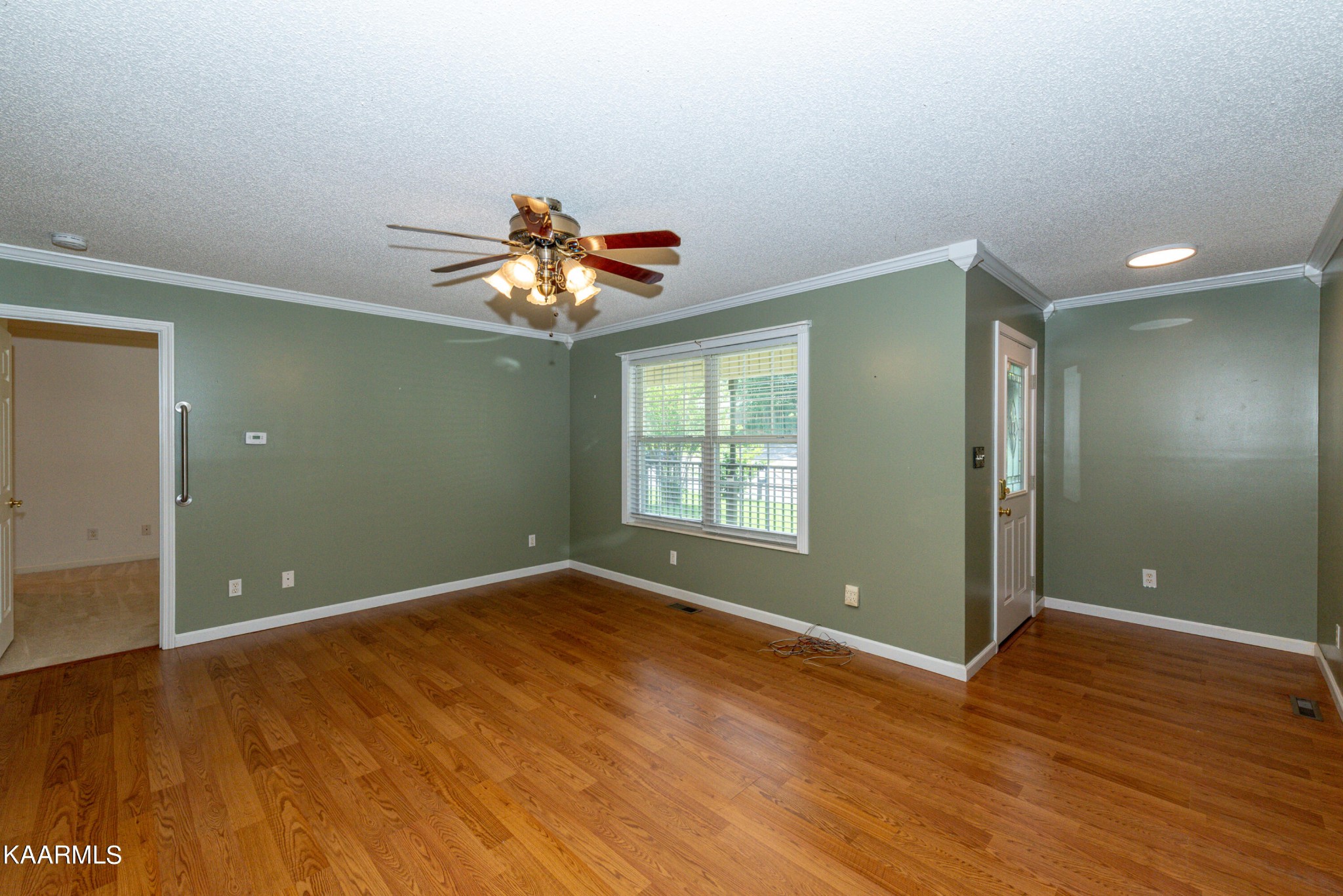 1613 Sevierville Road Maryville, TN 37804 - Photo 10 of 50 wooden floor in an empty room with a window