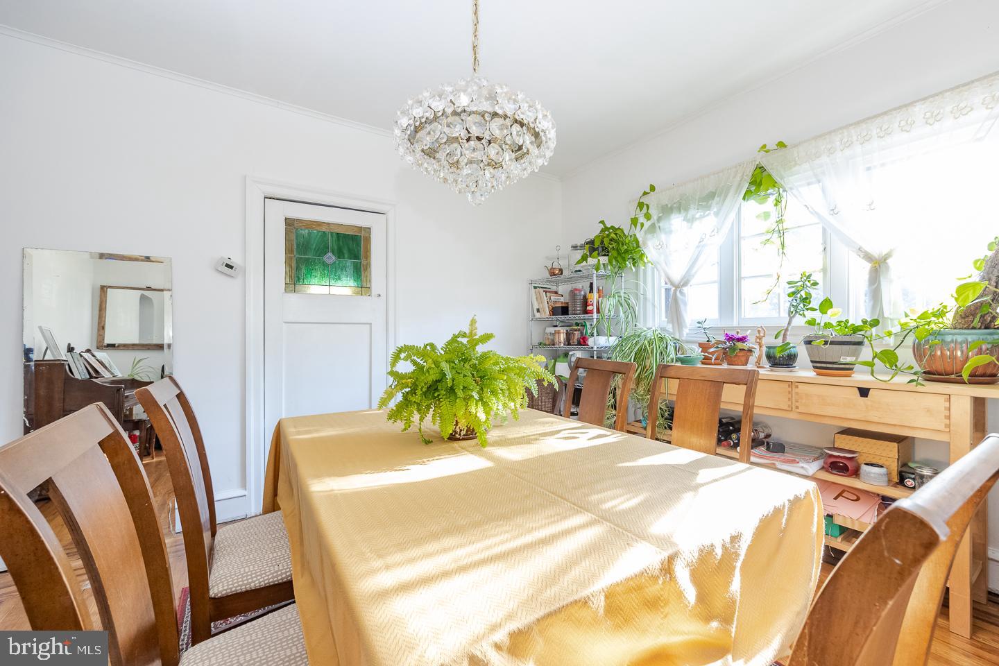 107 Crestview Road Upper Darby, PA 19082 - Photo 5 of 21 a bed room with two bed and a chandelier