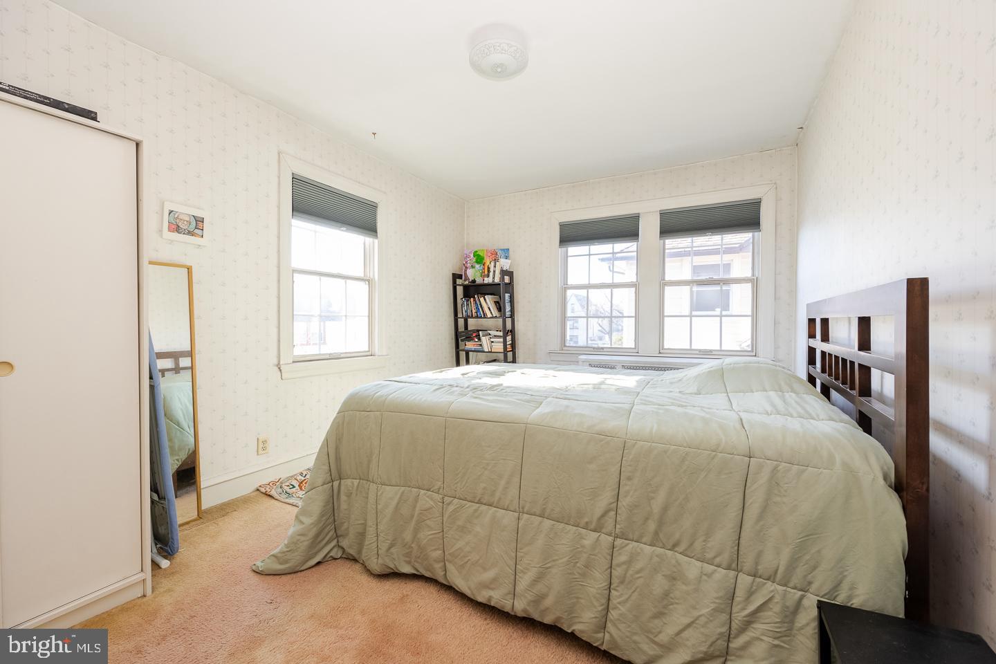 107 Crestview Road Upper Darby, PA 19082 - Photo 8 of 21 a bedroom with a bed and a window
