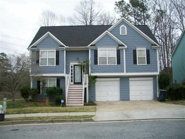 5180 Arrowind Road Northwest Lilburn, GA 30047 - Photo 1 of 1 Exterior Front. FRONT