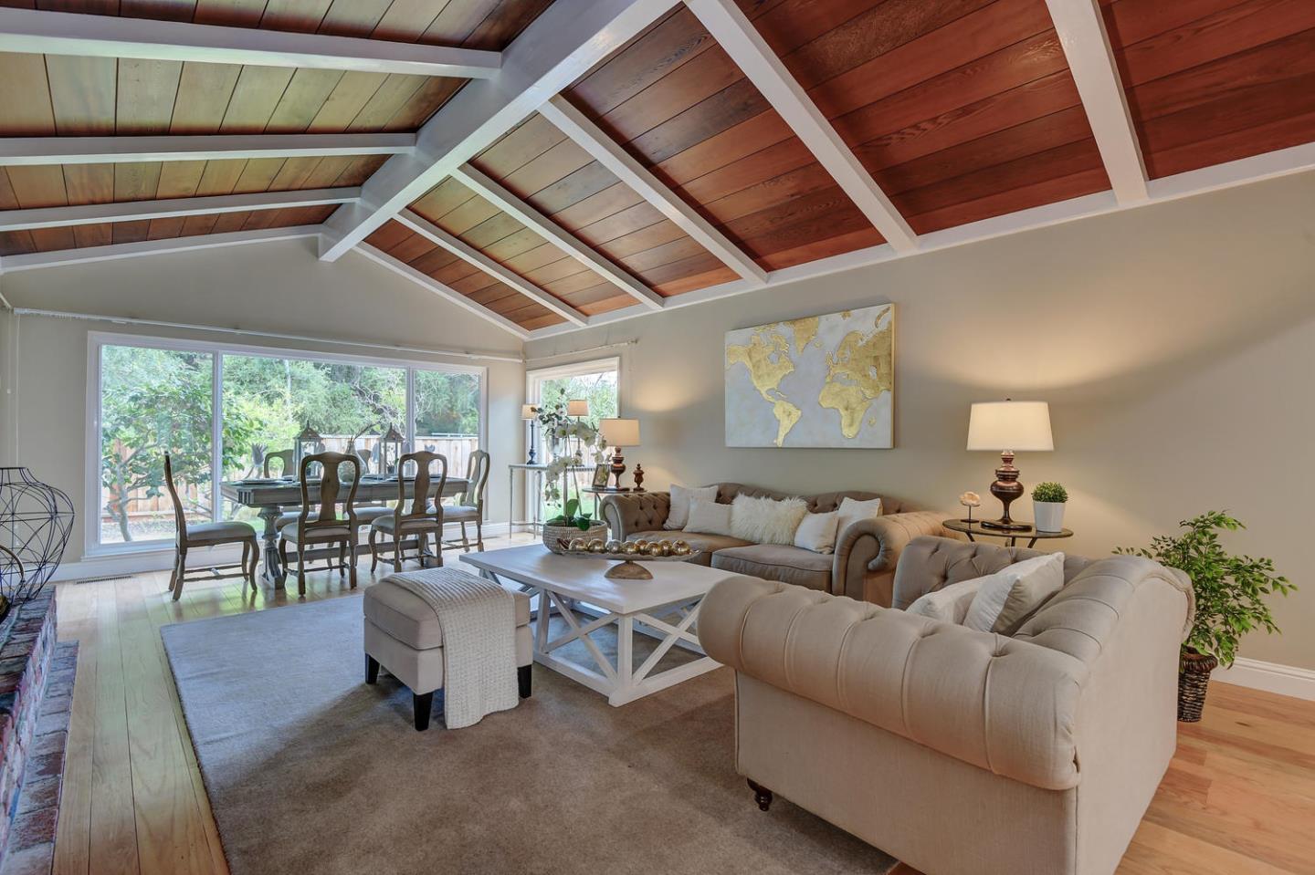 45 Stuart Court Los Altos, CA 94022 - Photo 4 of 10 a living room with furniture and a large window