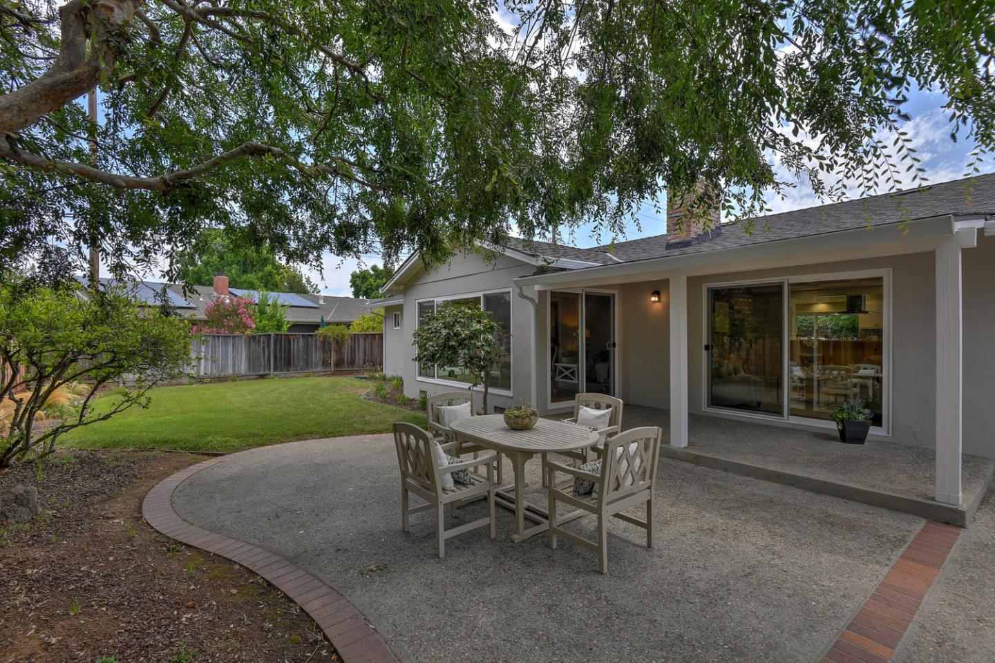 45 Stuart Court Los Altos, CA 94022 - Photo 6 of 10 a view of a house with a backyard and a garden