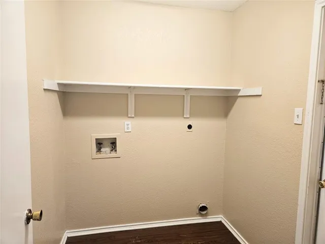 a view of small space with wooden floor