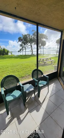 a kitchen with a sink a stove and cabinets