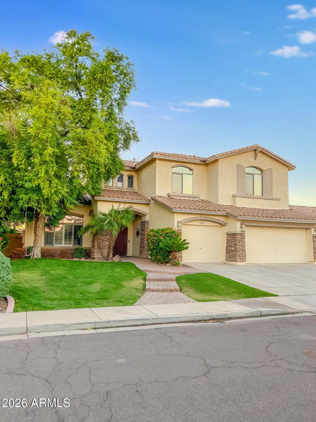 front view of a house with a yard