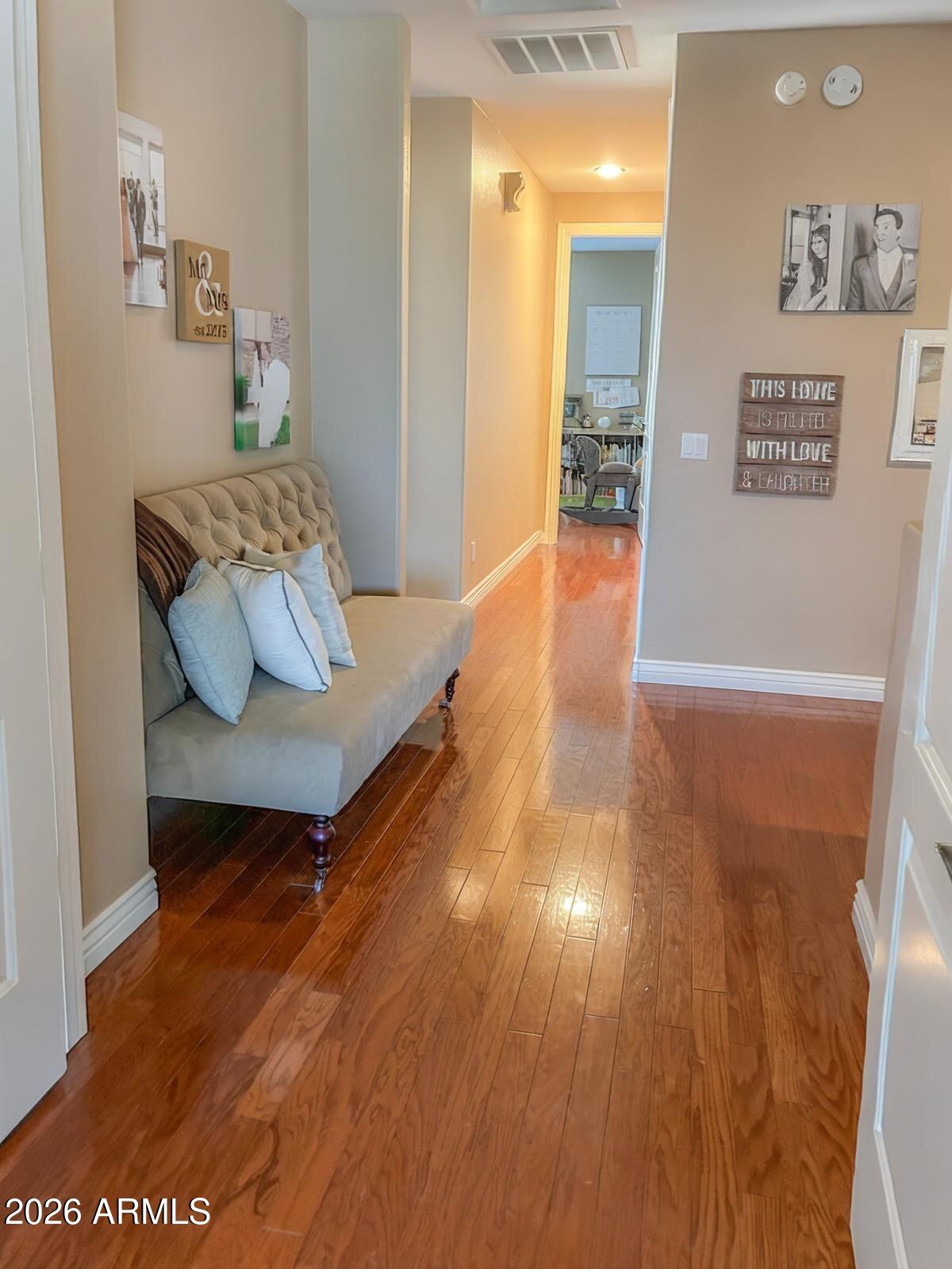 4450 South Rio Drive Chandler, AZ 85249 - Photo 15 of 29 a living room with couch and wooden floor