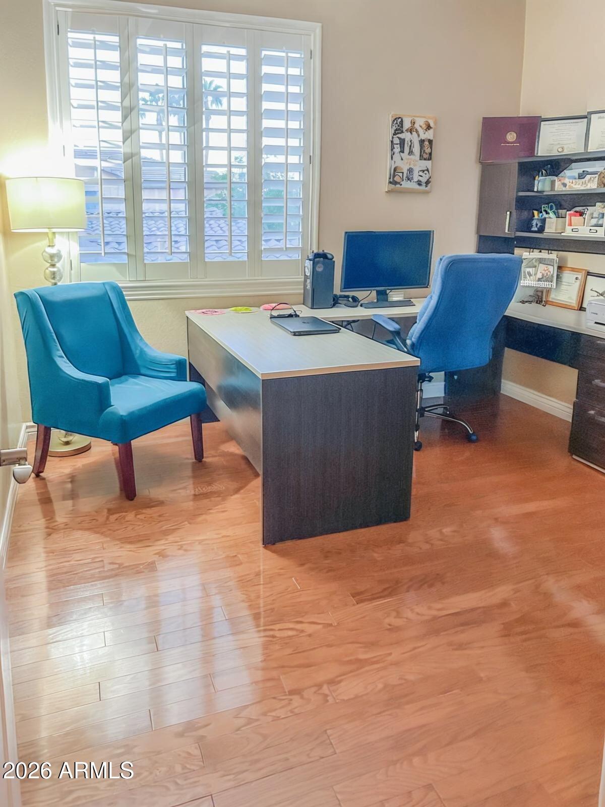 4450 South Rio Drive Chandler, AZ 85249 - Photo 21 of 29 a living room with furniture and a large window
