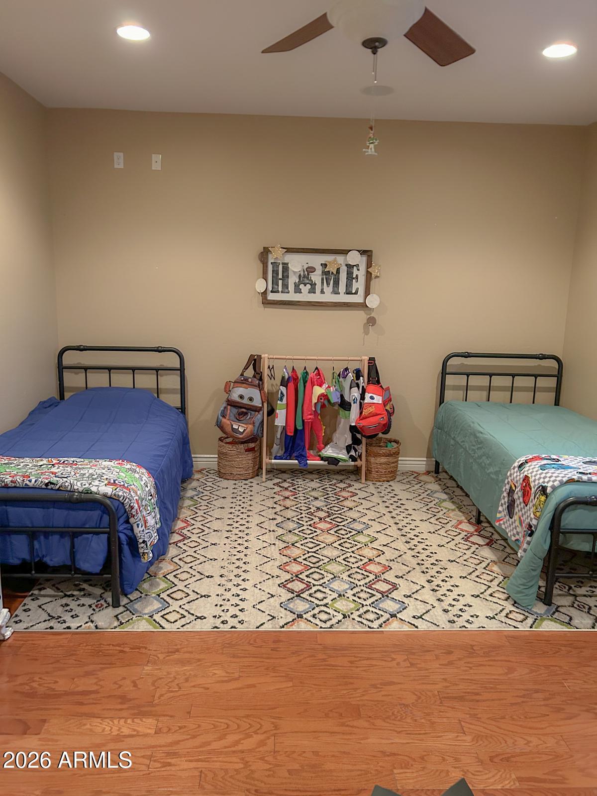 4450 South Rio Drive Chandler, AZ 85249 - Photo 22 of 29 a bedroom with a bed and a couch