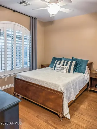 a view of a porch with furniture and a yard