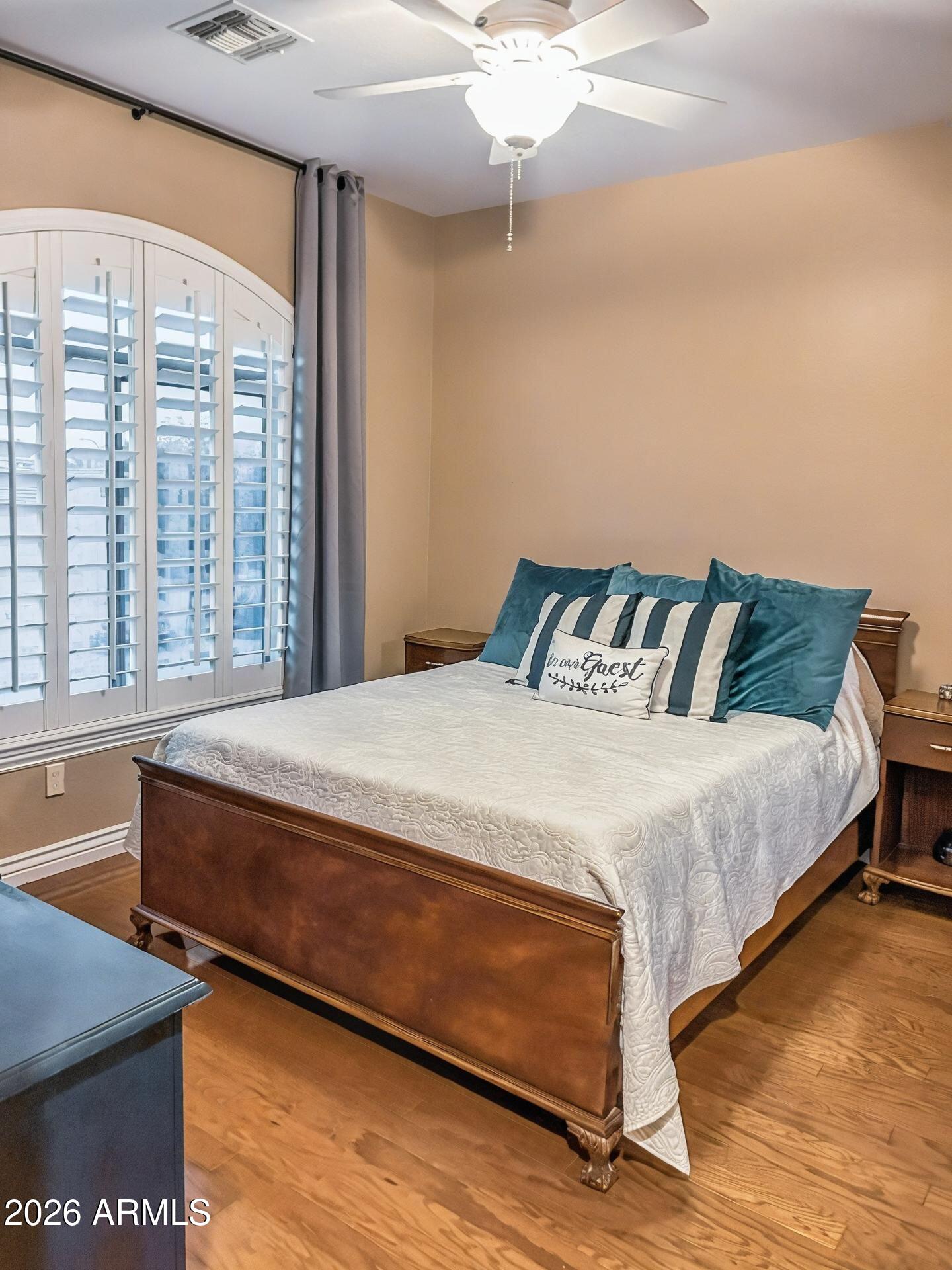 4450 South Rio Drive Chandler, AZ 85249 - Photo 24 of 29 a bedroom with a bed and window