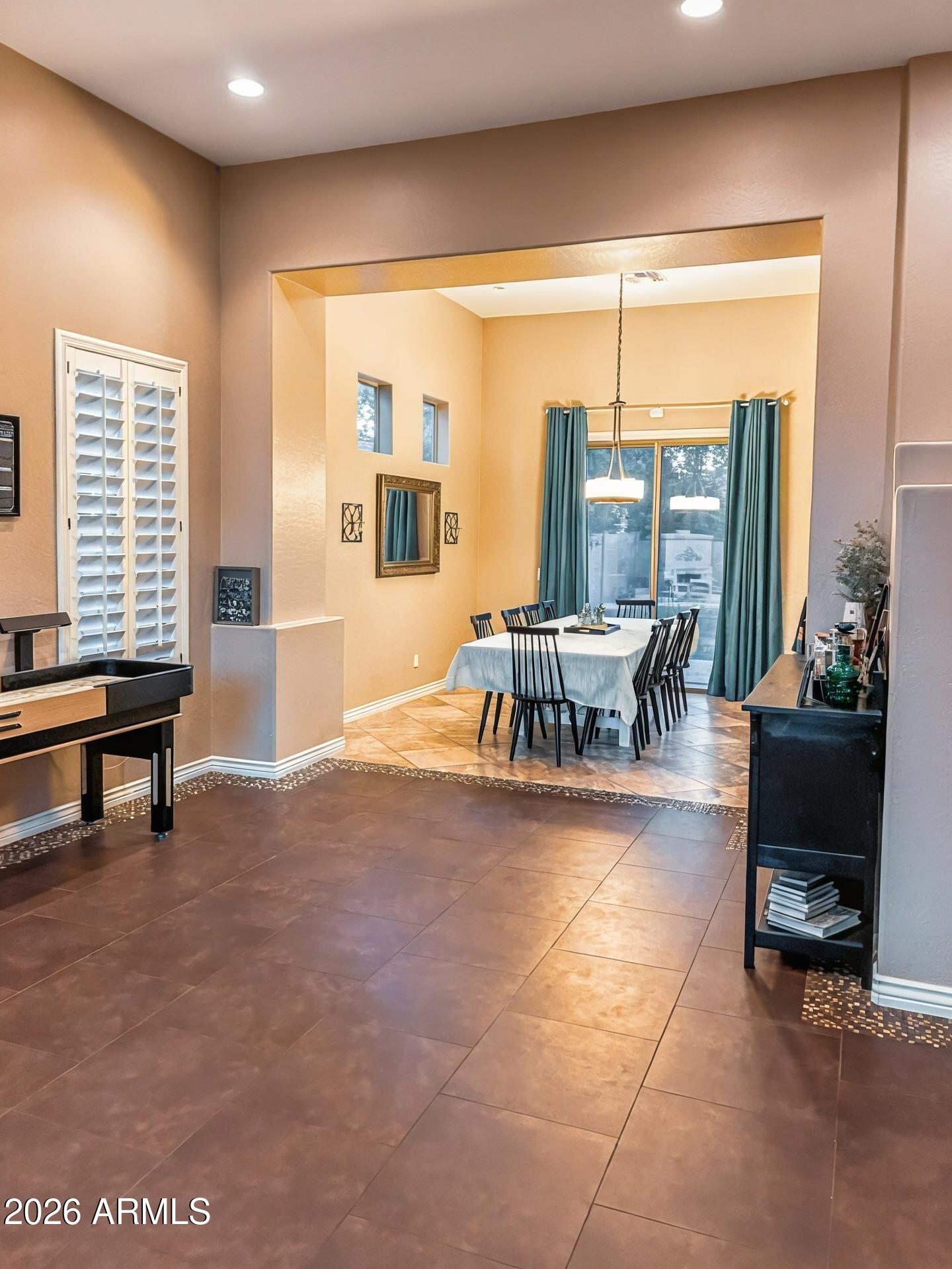 4450 South Rio Drive Chandler, AZ 85249 - Photo 4 of 29 a living room with furniture and large windows