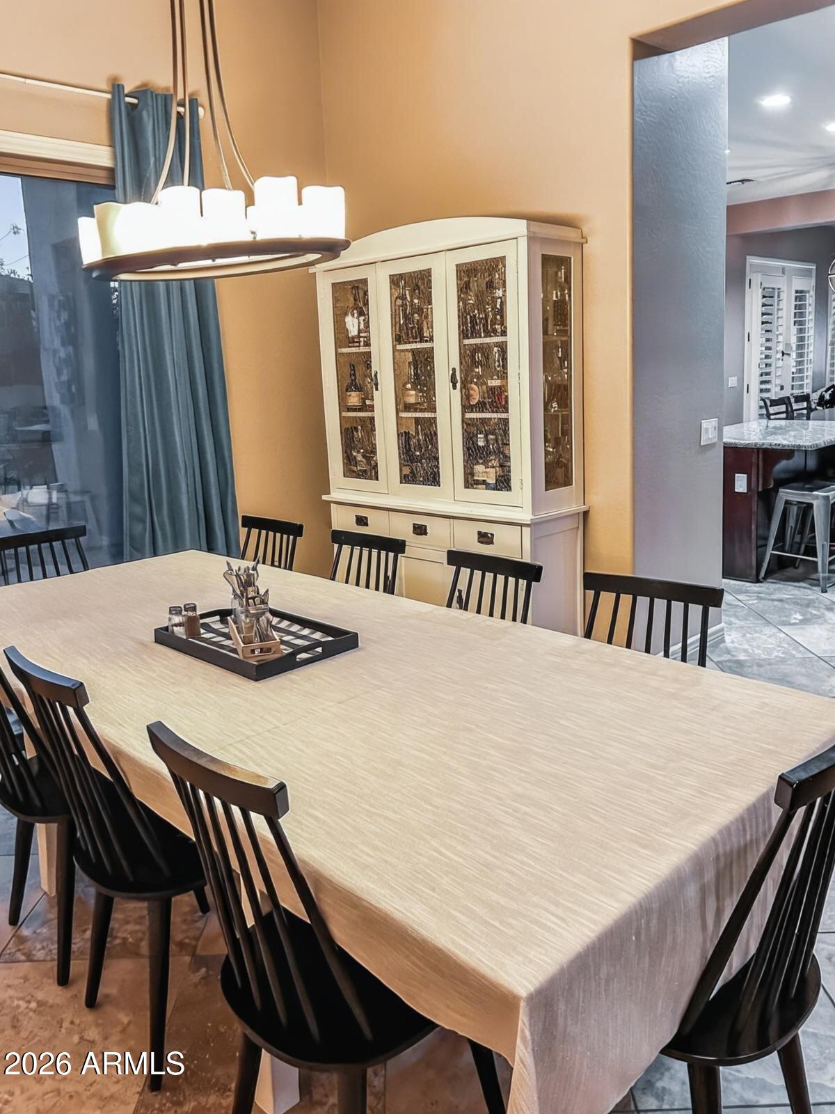 4450 South Rio Drive Chandler, AZ 85249 - Photo 6 of 29 a view of a dining room with furniture