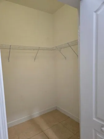 a view of a room with racks on the wall