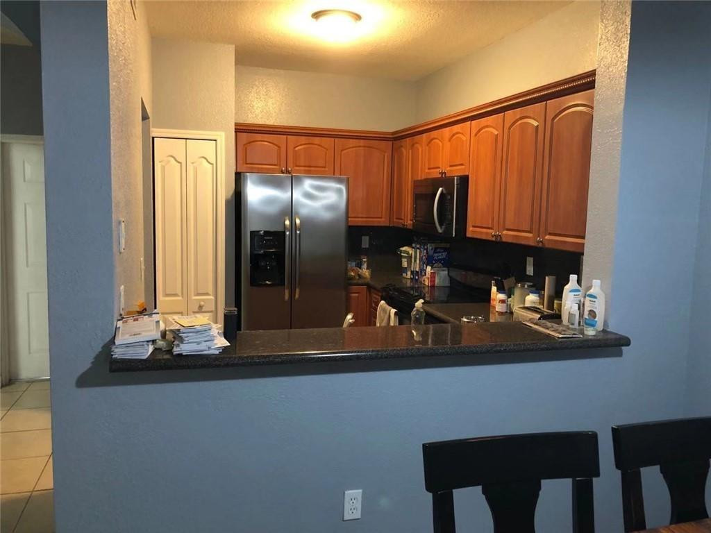 7060 Northwest 177th Street, Unit 103 Hialeah, FL 33015 - Photo 3 of 33 Photo 3