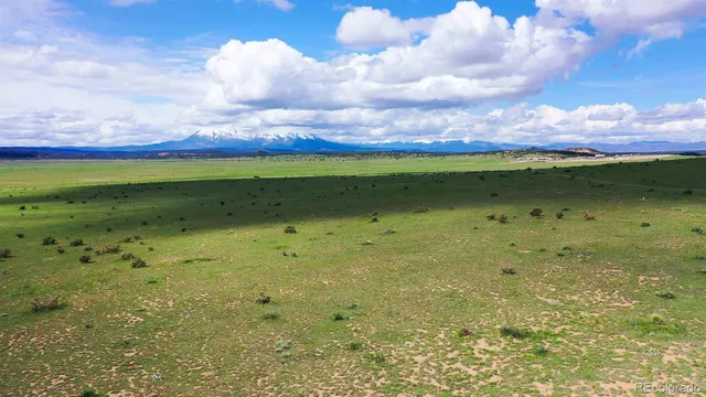 a view of lake with mountain