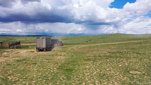 a view of a field with an outdoor space