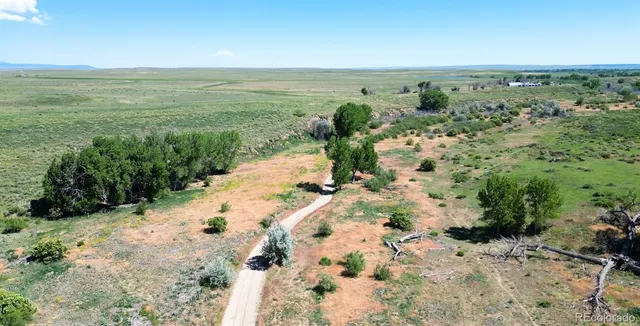 a view of an ocean beach and mountain
