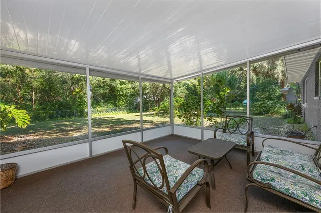a view of a city from a dining room with furniture window and outside view